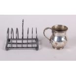 A Georgian silver christening mug and a silver six-division toast rack, 6.3oz troy approx