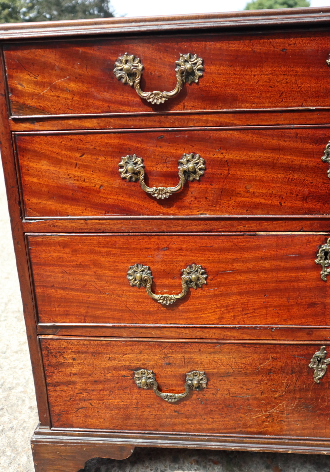 A George III mahogany chest of four long graduated drawers with gilt brass scroll handles, on - Image 2 of 4