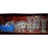 An etched glass ice bucket, vases, whisky tumblers, ashtrays and other glassware