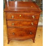 A 19th century mahogany and line inlaid bedside chest of three long drawers, on splay bracket