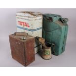 A Total aluminium petrol can, 19 1/2" high, and another similar