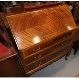 A 1930s walnut fall front bureau, on cabriole supports, 31" wide x 18" deep x 39" high