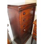 A 19th century walnut Wellington chest, fitted seven graduated drawers, on block base, 28 1/2"