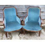 A pair of 1930s Art Deco Continental rosewood showframe armchairs, upholstered in a blue velour,