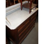 A Belgian figured mahogany marble top washstand, fitted two small and three long graduated