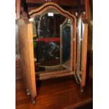 A walnut triple plate swing frame toilet mirror, central section 17" wide x 27" high