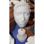 A 19th century plaster death mask of woman, on stone base (damages)