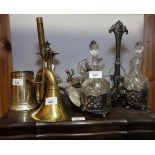 A canteen of silver plated cutlery, an oil and vinegar stand, plated cockerels and other items