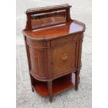 A late 19th century mahogany inlaid side cabinet with raised mirror back over enclosed panel door,