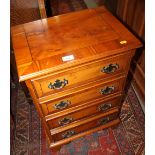 A pair of yew and banded bedside chests of four long drawers, 18" wide x 12 1/2" deep x 28 1/2" high