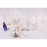 A pair of modernist glass candlesticks, a Wedgwood glass candlestick, a number of glass swans and