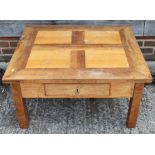 A walnut coffee table, 31" x 35" x 18 1/2" high