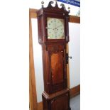 A late 18th century oak and mahogany long case clock with eight-day movement and painted dial with