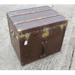A late 19th century Louis Vuitton printed canvas, leather and brass mounted travel hat box/trunk