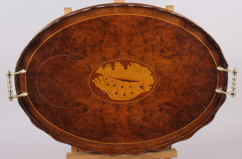 A walnut and banded galleried tray with brass carrying handles