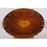 A walnut and banded galleried tray with brass carrying handles