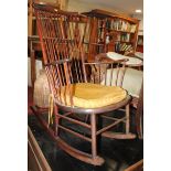 A modern stick back rocking chair and a mahogany wine table, 16" dia