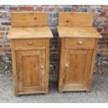 A pair of waxed pine bedside cupboards, fitted one drawer over one drawer, 18" wide x 13" deep x 36"