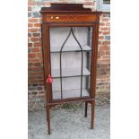 An Edwardian walnut and inlaid display cabinet enclosed panelled glazed door, 24" wide x 12" deep