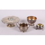 A silver pedestal bonbon dish with pierced and embossed decoration, a silver pedestal bowl with