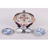 A Chinese tea bowl decorated with cranes, three pieces of Chinese export blue and white china and an