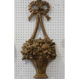 A carved giltwood wall hanging basket with ribbon suspension loop, 25" high