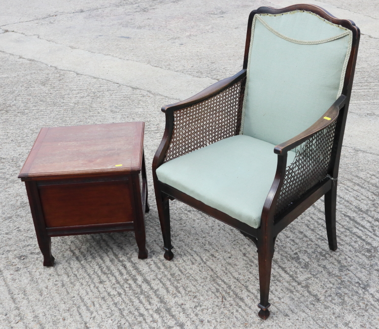 A 19th century mahogany commode stool and a cane seat open armchair