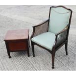 A 19th century mahogany commode stool and a cane seat open armchair