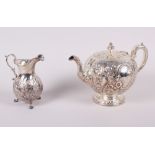 A Victorian Scottish silver teapot with embossed Rococo decoration, Marshall &