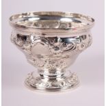 A Georgian silver pedestal bowl with embossed floral decoration, 7.1oz troy approx