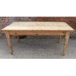 A pine scrub top kitchen table, on turned supports, top 35" x 71"
