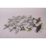 A Dinky Toys die-cast model Junkers plane, a Dinky Toys Spitfire MK II, a Dinky Toys Gloster Javelin