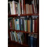 A collection of volumes, mostly non-fiction, gardening, etc