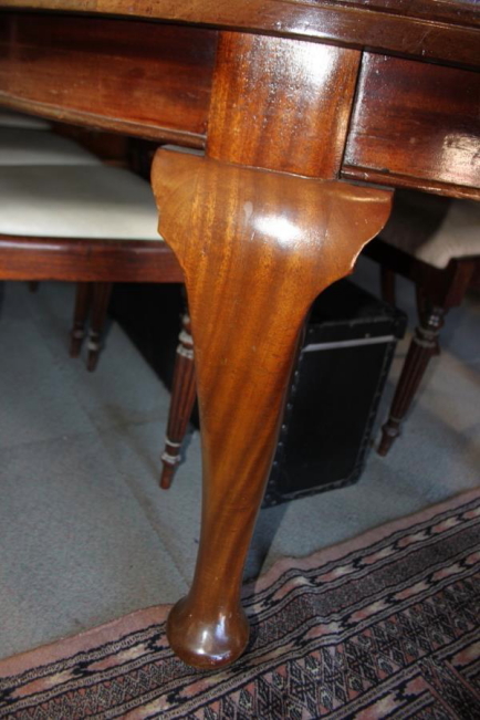 A 19th century mahogany extending dining table with three extra leaves, on cabriole supports and pad - Image 2 of 3