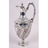 A silver water jug with embossed decoration, 29.4oz troy approx