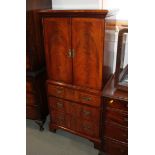 A Brights of Nettlebed figured walnut and banded side cabinet, fitted three drawers, 22" wide x