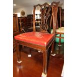 A carved mahogany Chippendale design side chair with Gothic pierced splat