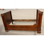 A French 19th century walnut lit bateau, 44 1/2" wide overall x 66" long