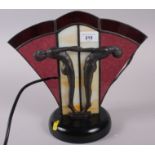 An Art Deco design lamp with athletes and glass panel, 11" high
