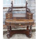 A late 19th century polished as burr walnut duchess dressing table, fitted jewel drawers over one