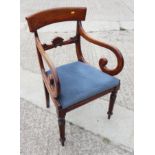An early 19th century mahogany bar back carver dining chair with drop-in seat, on turned supports