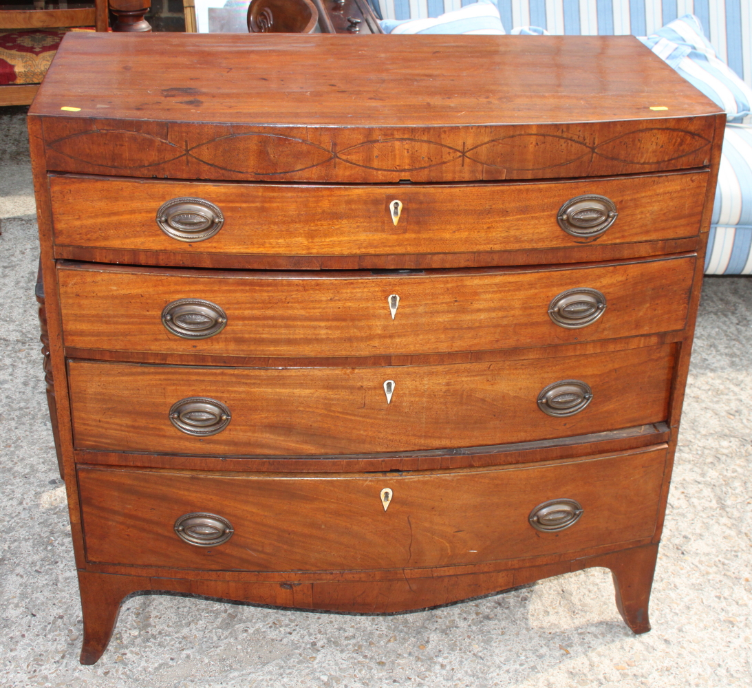 A George III mahogany bowfront chest of four drawers, 36 1/2" wide