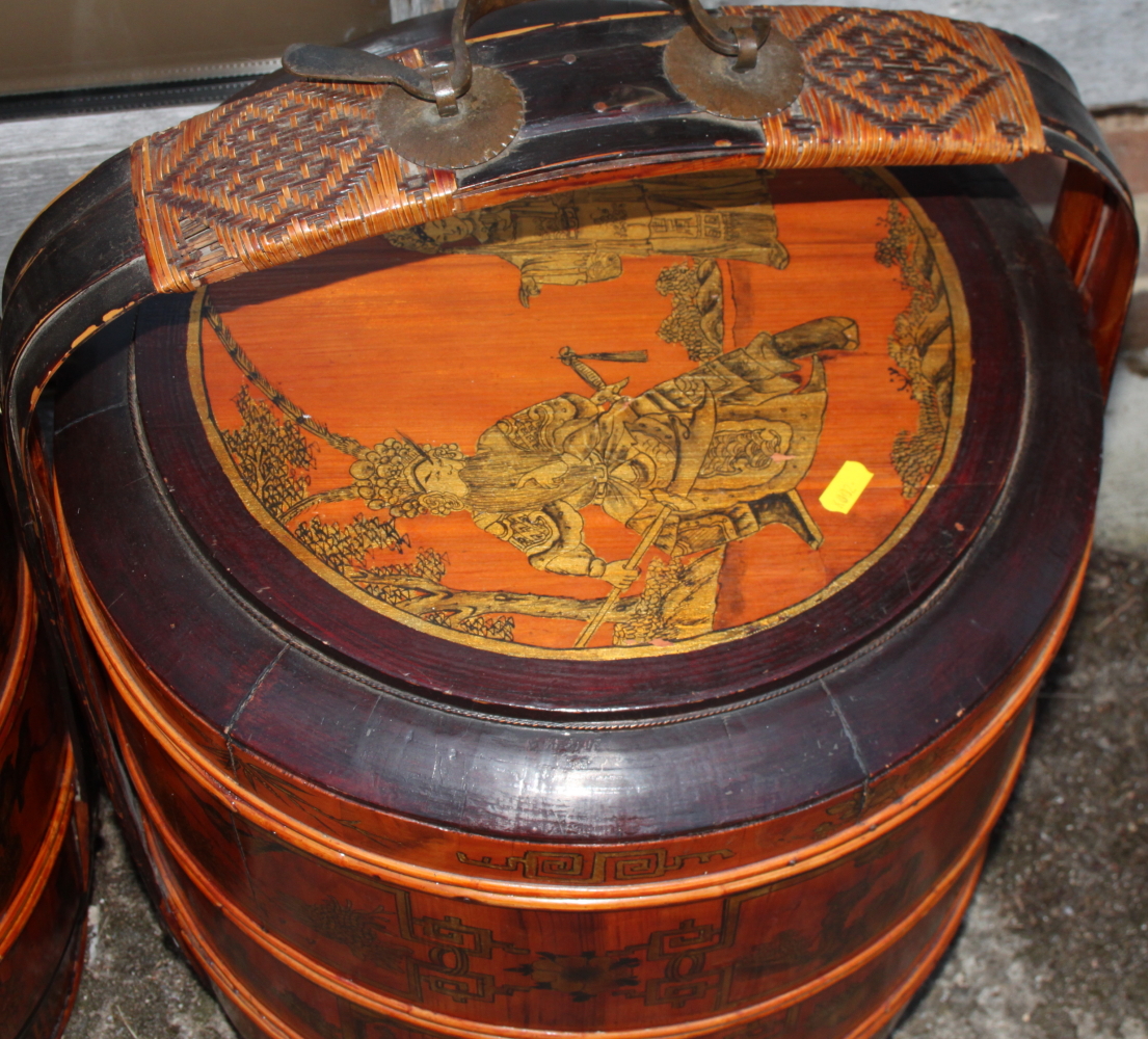 A pair of Chinese lacquered four-tier wedding baskets, decorated panels with figures and fruit, - Image 4 of 4