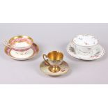 A Royal Worcester cabinet cup and saucer, painted fruit, by T Lockyer (chip to rim) and two other