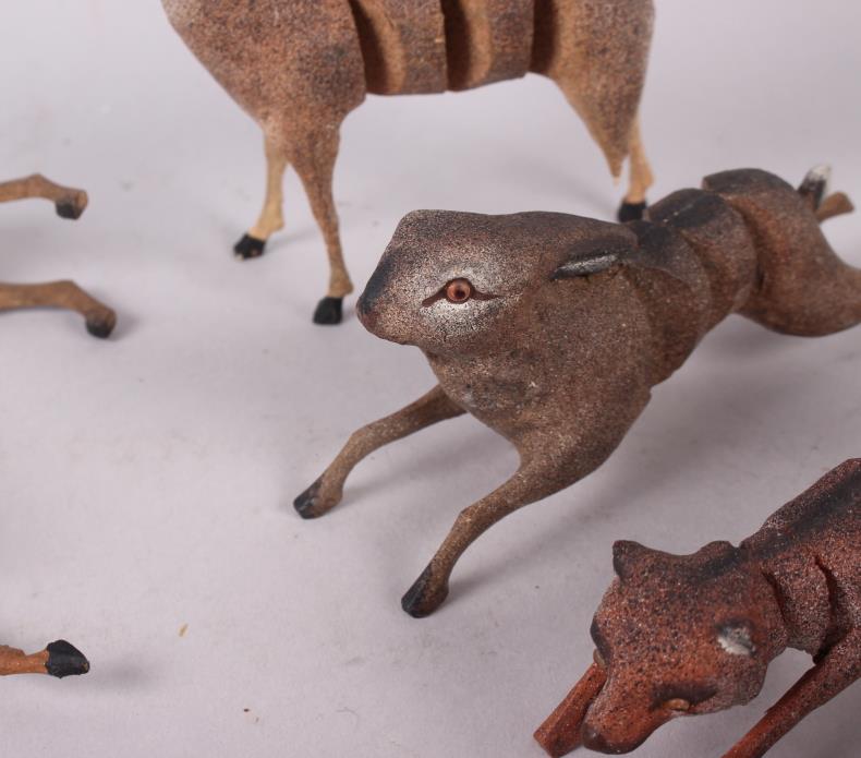 A collection of carved wooden articulated animals (damages) - Image 4 of 4