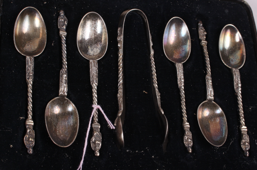 A cased set of six silver apostle teaspoons with matching tongs and two other silver plated sets - Image 4 of 4