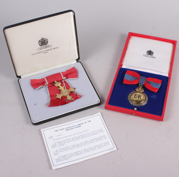An OBE and Imperial Service medal, presented to Miss Thayer