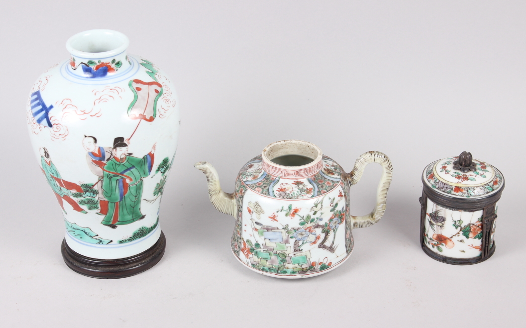 A Chinese famille vert baluster vase, decorated figures in a garden, 7" high, a famille vert teapot,