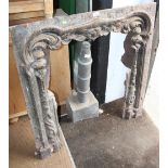 A cast iron fireplace surround, 38" high (damages)