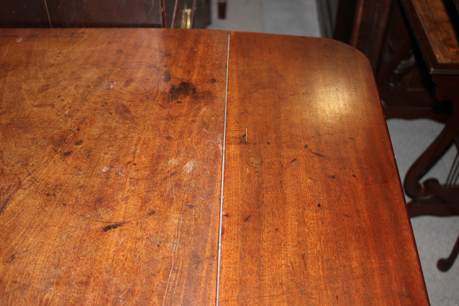 A George III Cuban mahogany pad foot drop leaf table, 36" wide x 33" deep x 28" high - Image 6 of 7